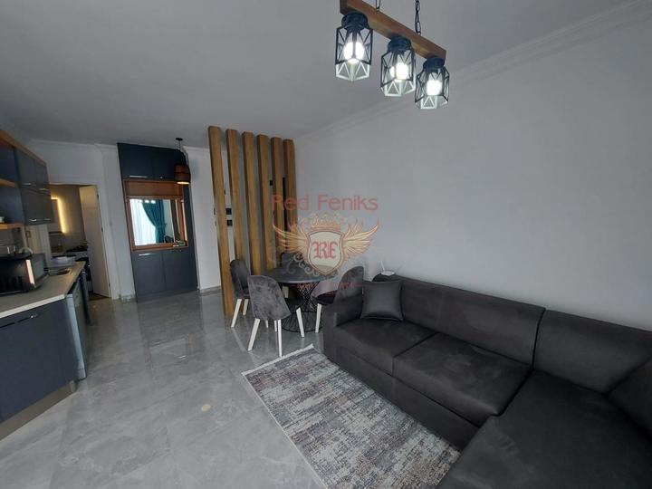 Apartment 1+1 Penthouse (60 m²) 3 Minuten vom Strand entfernt, Wohnungen in Nordzypern, Wohnungen mit hohem Mietpotential in Nordzypern kaufen